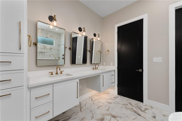 1426 Kalob Cir, Harlingen, TX 78552 - bathroom with a marble finish shower, marble finish flooring, double vanity, and baseboards