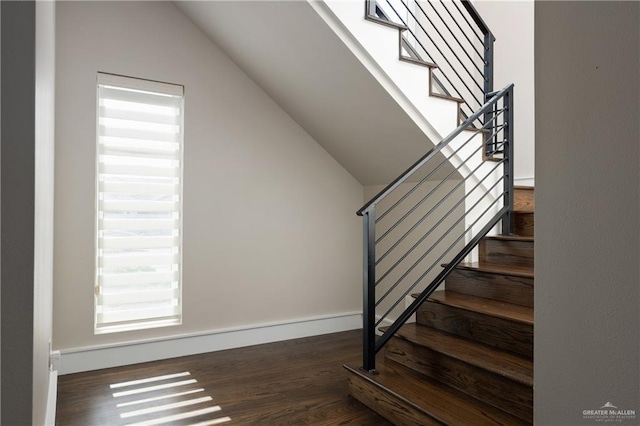 1426 Kalob Cir, Harlingen, TX 78552 - stairway with lofted ceiling, wood finished floors, and baseboards