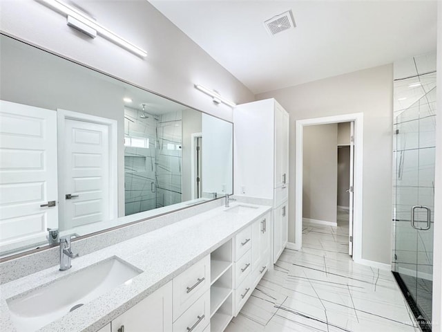 bathroom featuring vanity and walk in shower