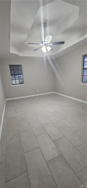 spare room with ceiling fan