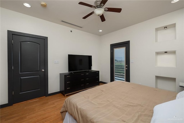 1304 E Camellia Ave Unit 2, Mcallen, TX 78501 - bedroom featuring recessed lighting, access to outside, light wood-type flooring, baseboards, and visible vents