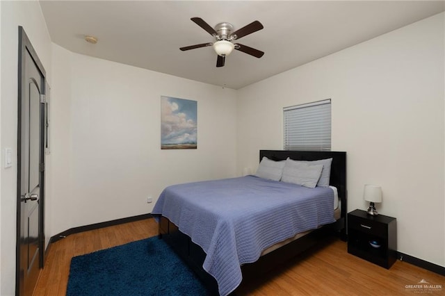 1304 E Camellia Ave Unit 2, Mcallen, TX 78501 - bedroom with light wood finished floors, a ceiling fan, and baseboards