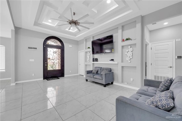 502 Oak Ridge St, Donna, TX 78537 - entryway featuring ceiling fan, recessed lighting, and a tray ceiling