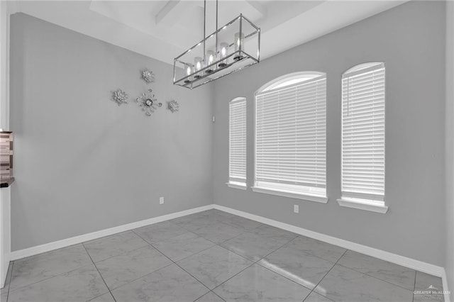 502 Oak Ridge St, Donna, TX 78537 - unfurnished dining area featuring marble finish floors and a chandelier