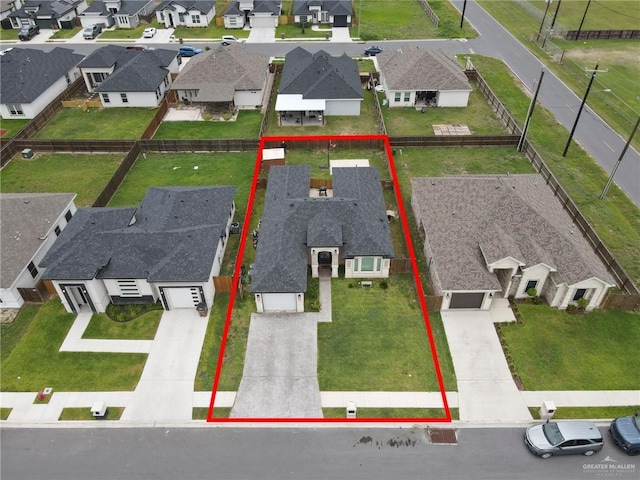 502 Oak Ridge St, Donna, TX 78537 - aerial perspective of suburban area featuring property parcel outlined