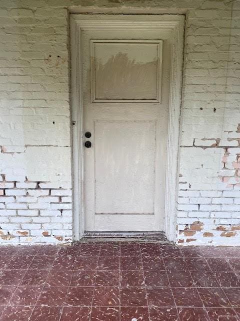 223 W Schunior St, Edinburg, TX 78541 - entrance to property with brick siding