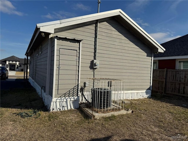 view of outbuilding with cooling unit