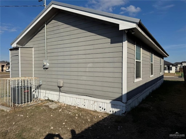 view of home's exterior featuring central air condition unit