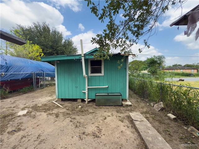 210 N Palmas St, Weslaco, TX 78596 - view of shed with fence