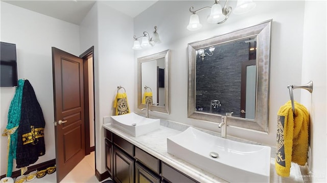 5403 Mauritius Ln, Edinburg, TX 78542 - full bathroom featuring tile patterned flooring, double vanity, and a sink