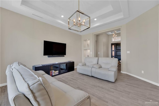 4001 Santa Erica St, Mission, TX 78572 - living area featuring a raised ceiling, a chandelier, baseboards, wood finished floors, and recessed lighting