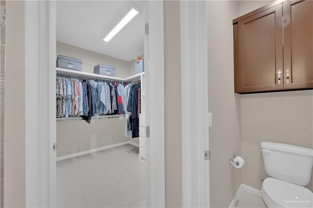 4001 Santa Erica St, Mission, TX 78572 - bathroom with toilet, baseboards, and a spacious closet