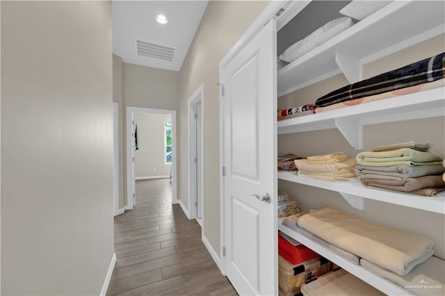 4001 Santa Erica St, Mission, TX 78572 - hall with baseboards, wood finished floors, and recessed lighting
