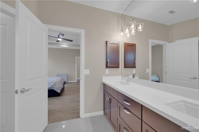 4001 Santa Erica St, Mission, TX 78572 - full bath with connected bathroom, double vanity, baseboards, and a ceiling fan
