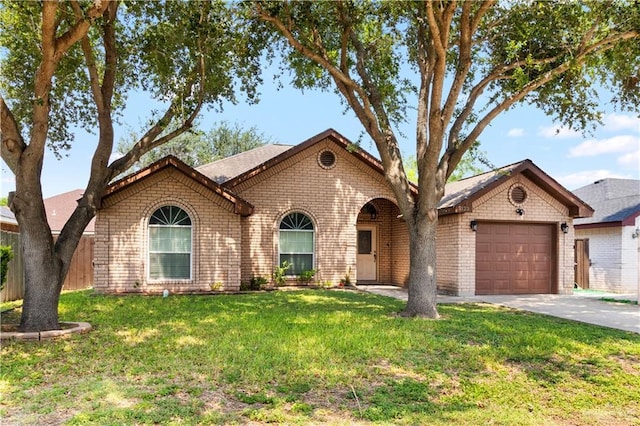 single story home with a garage, brick siding, and driveway
