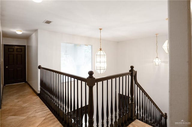 corridor featuring tile patterned flooring