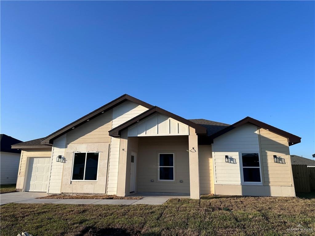 single story home with a garage