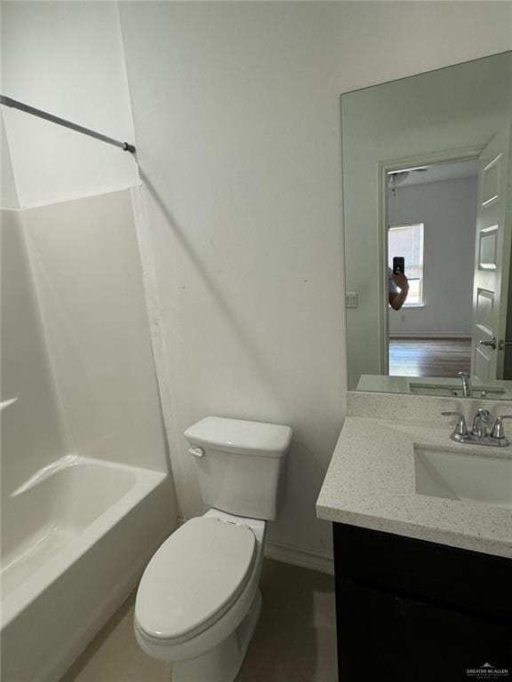 full bathroom featuring vanity, toilet, and tub / shower combination