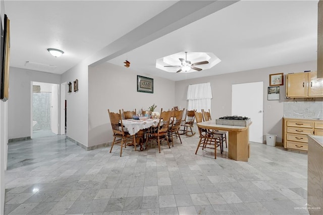 dining space with ceiling fan