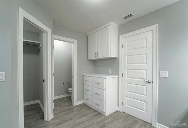 3708 Climax Dr, Edinburg, TX 78542 - bathroom with toilet and wood finished floors