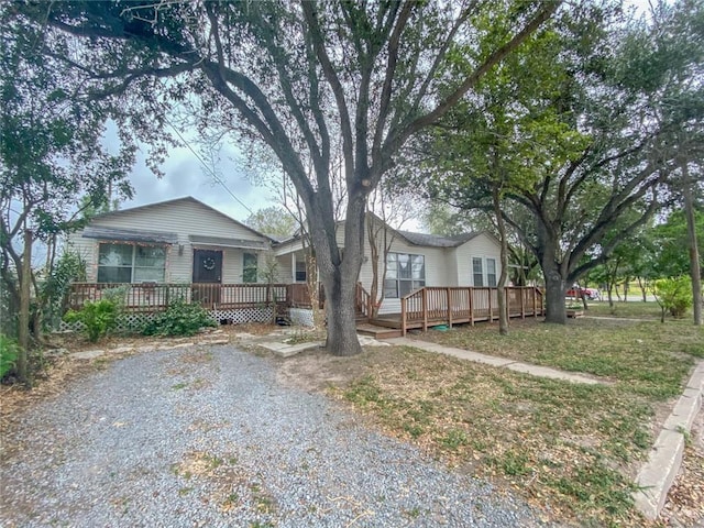 view of front of property with a deck