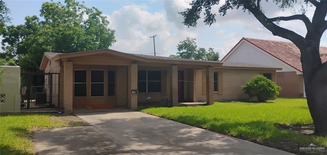 2008 Harvey St, Mcallen, TX 78501 - single story home with a front lawn and brick siding