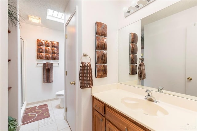 200 E Yuma Ave Unit 5, Mcallen, TX 78503 - bathroom with vanity, a shower stall, and tile patterned floors