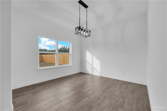 unfurnished dining area with hardwood / wood-style floors