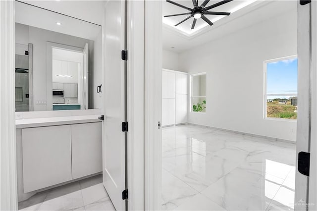 bathroom with vanity and ceiling fan