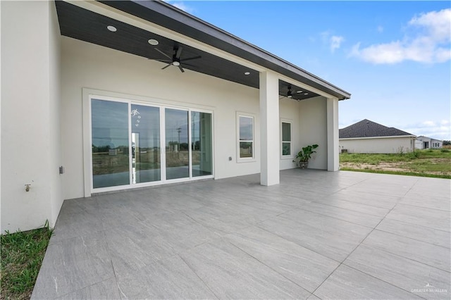 view of patio / terrace featuring ceiling fan