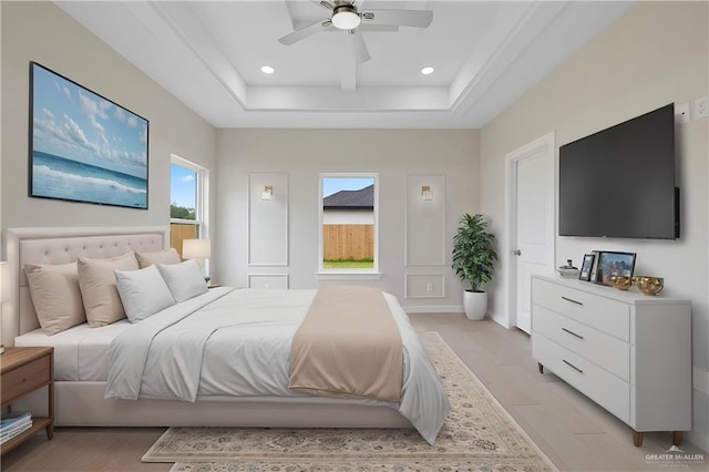 9110 N 25th St, Mcallen, TX 78504 - bedroom with a raised ceiling, light wood finished floors, recessed lighting, and ceiling fan