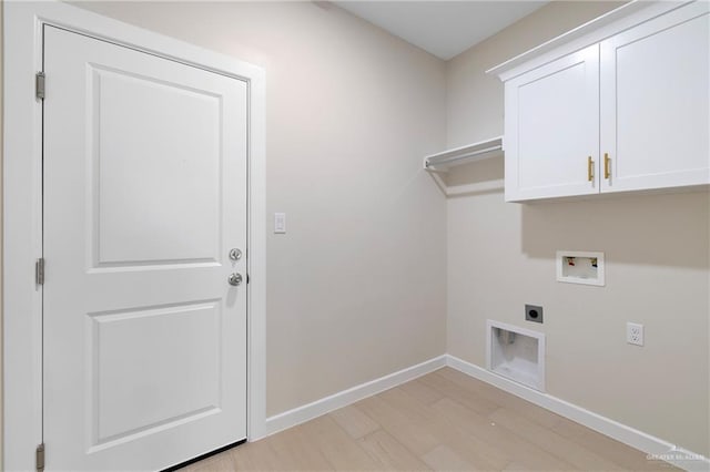 9110 N 25th St, Mcallen, TX 78504 - washroom with electric dryer hookup, hookup for a washing machine, baseboards, light wood-type flooring, and cabinet space