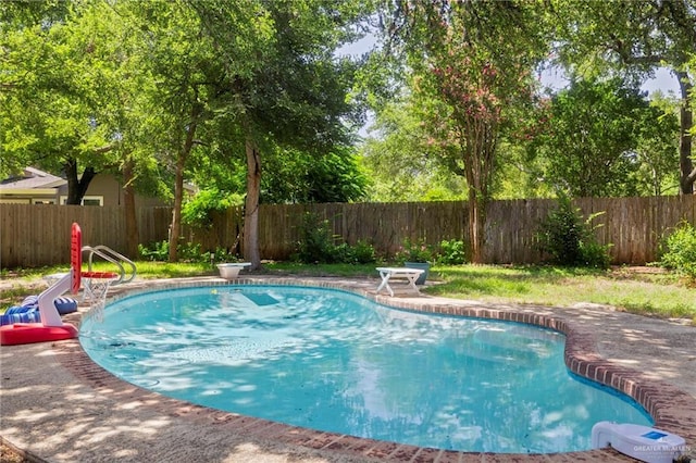 view of pool with a patio