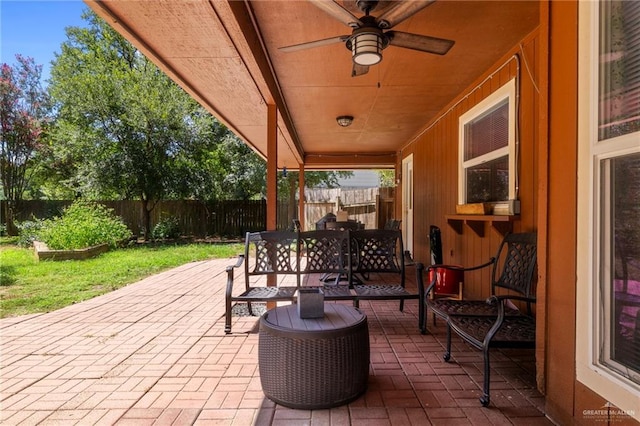 view of patio featuring ceiling fan