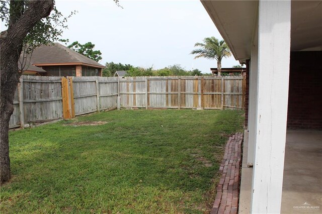 view of yard featuring a fenced backyard