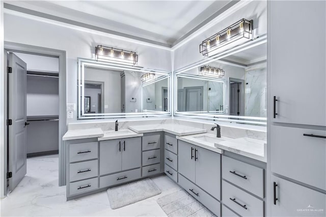 bathroom featuring vanity and marble finish floor