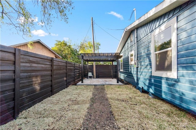 710 N Dahlia St, Pharr, TX 78577 - fenced backyard with a patio area and a pergola
