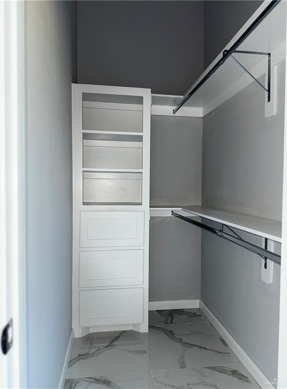 532 Demi St, Edinburg, TX 78542 - walk in closet featuring marble finish flooring