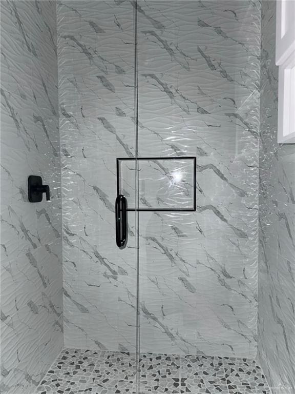 532 Demi St, Edinburg, TX 78542 - bathroom featuring a marble finish shower