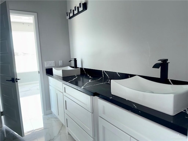 532 Demi St, Edinburg, TX 78542 - full bathroom featuring marble finish floors and double vanity