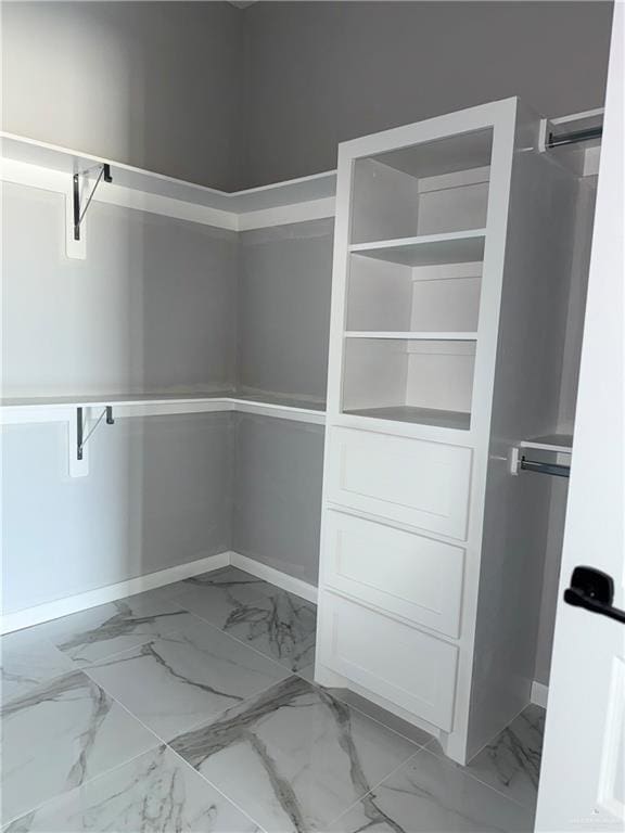 532 Demi St, Edinburg, TX 78542 - spacious closet featuring light marble finish flooring