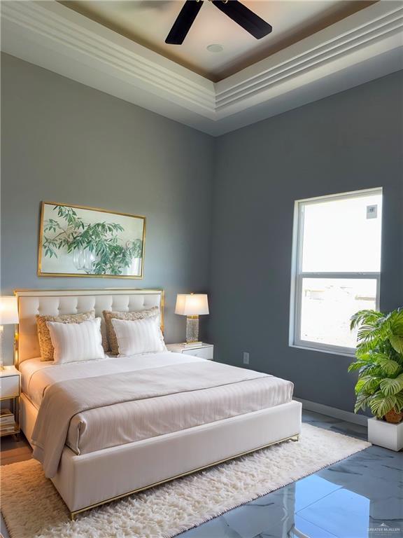 532 Demi St, Edinburg, TX 78542 - bedroom with a raised ceiling, a ceiling fan, and baseboards