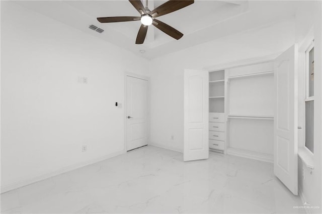 unfurnished bedroom featuring a closet and ceiling fan