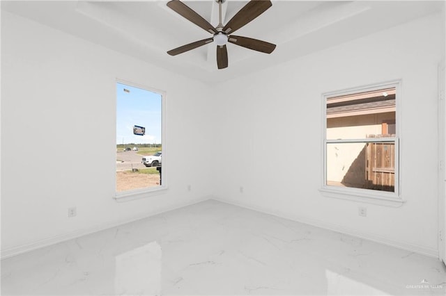 spare room featuring ceiling fan