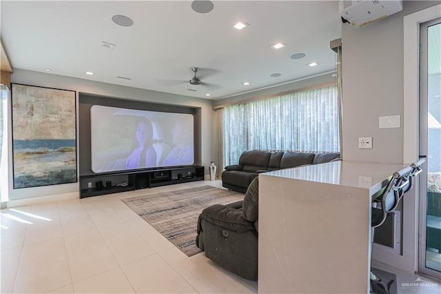 home theater room with ceiling fan