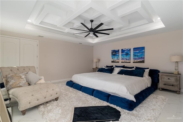 bedroom with coffered ceiling, beamed ceiling, and ceiling fan