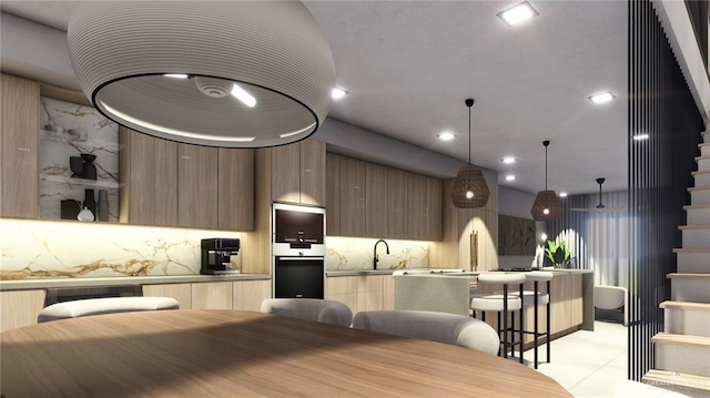 kitchen featuring tasteful backsplash, sink, light tile patterned floors, and decorative light fixtures