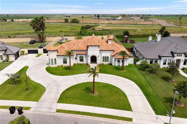 birds eye view of property featuring a rural view