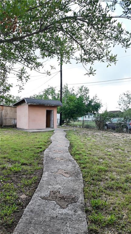 612 W Ramirez St, Rio Grande City, TX 78582 - view of yard featuring a shed