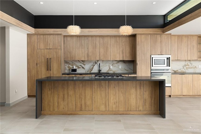 kitchen with stainless steel appliances, backsplash, light tile patterned flooring, and pendant lighting